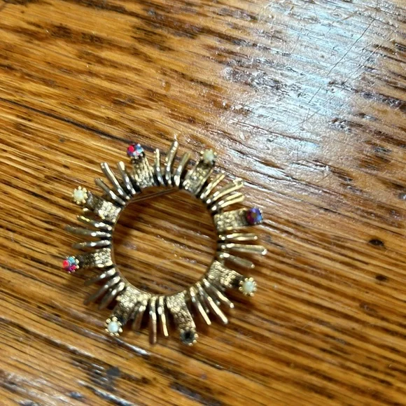 Assorted costume jewelry.  Includes 8 pieces. Seven pins and 1 bracelet. - Picture 5 of 10